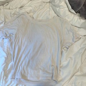 Ribbed white top, the tag says large but it fits like a small